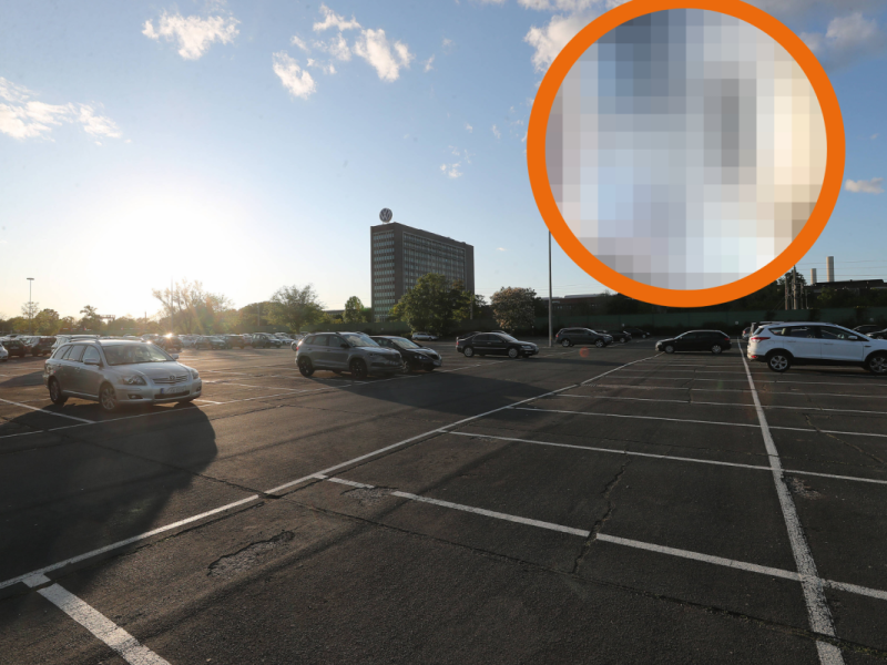 Parkplatz von VW mit verpixeltem Bild in der Ecke
